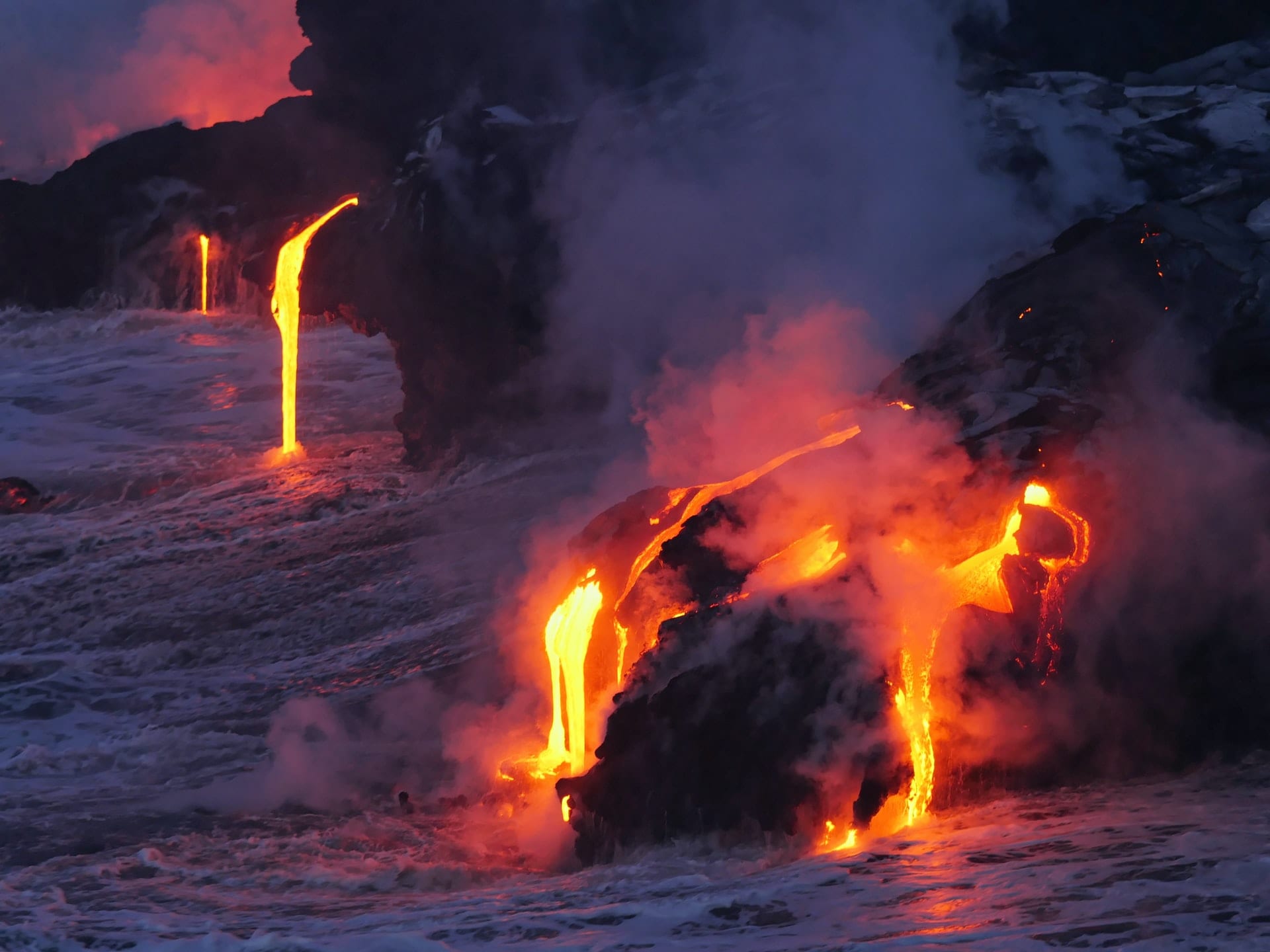 Lava from Kilauea on Hawaii flows into the ocean.